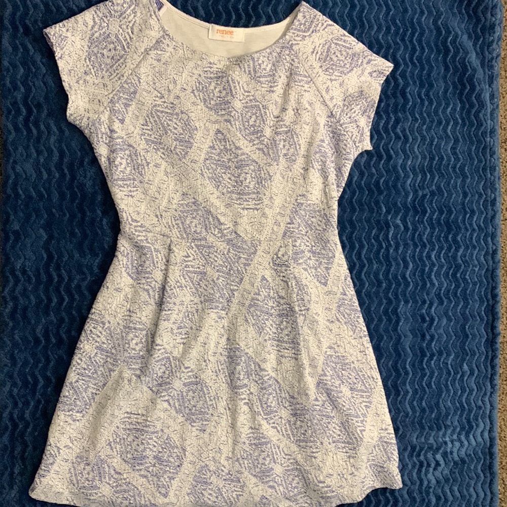 Cute and comfortable dress!! Beautiful color!! Knee length on petite person.